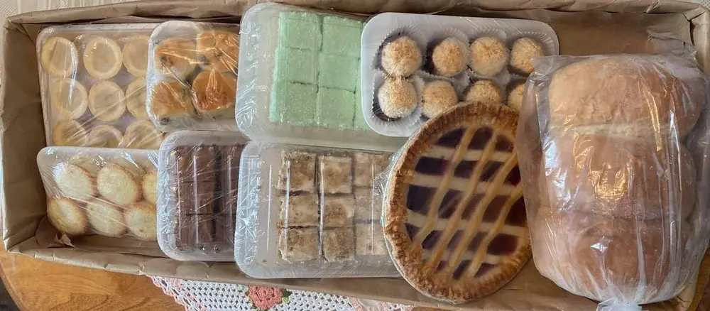 A box of baked goods and desserts from the tea room's bakery
